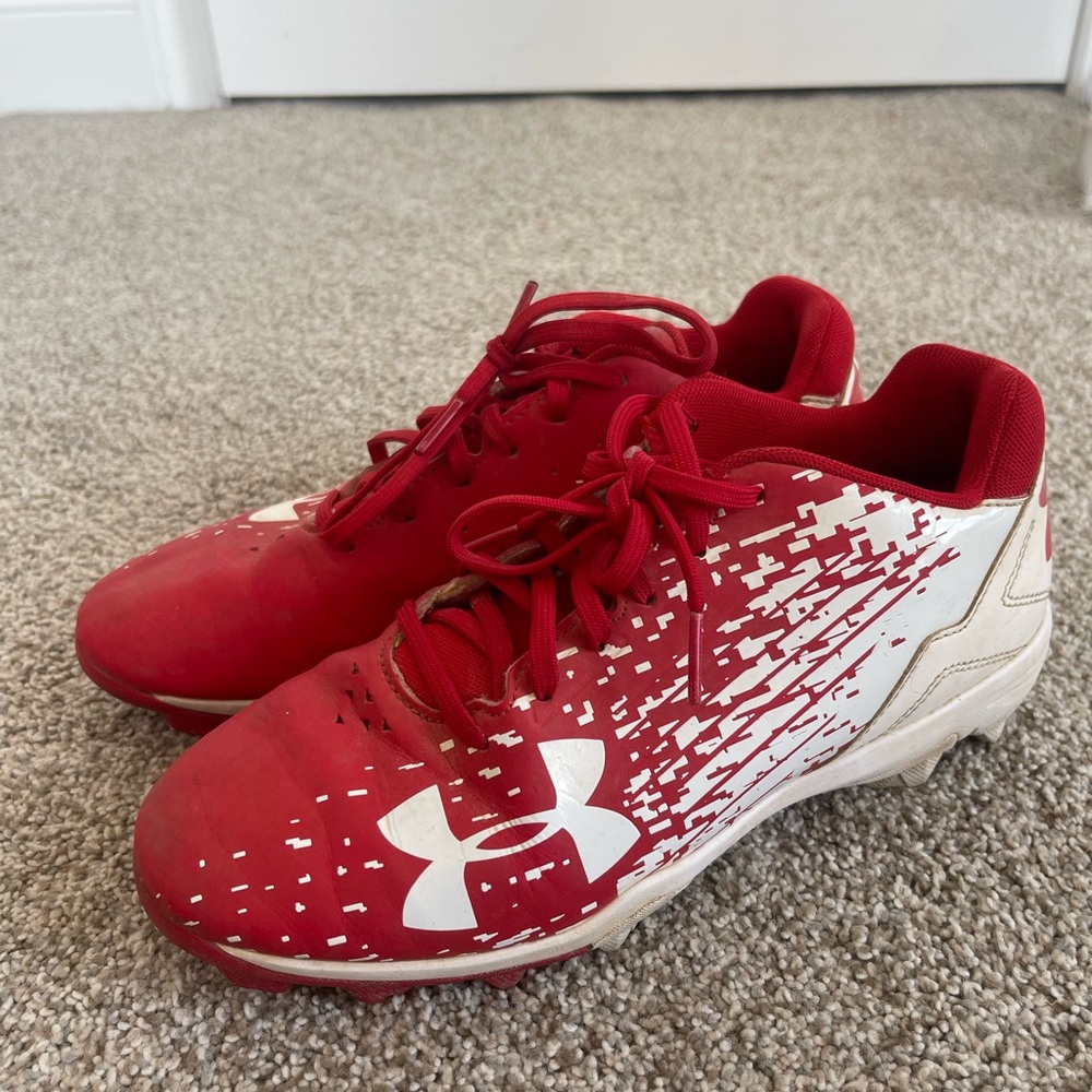 Youth Under Armour Red and White Baseball cleats